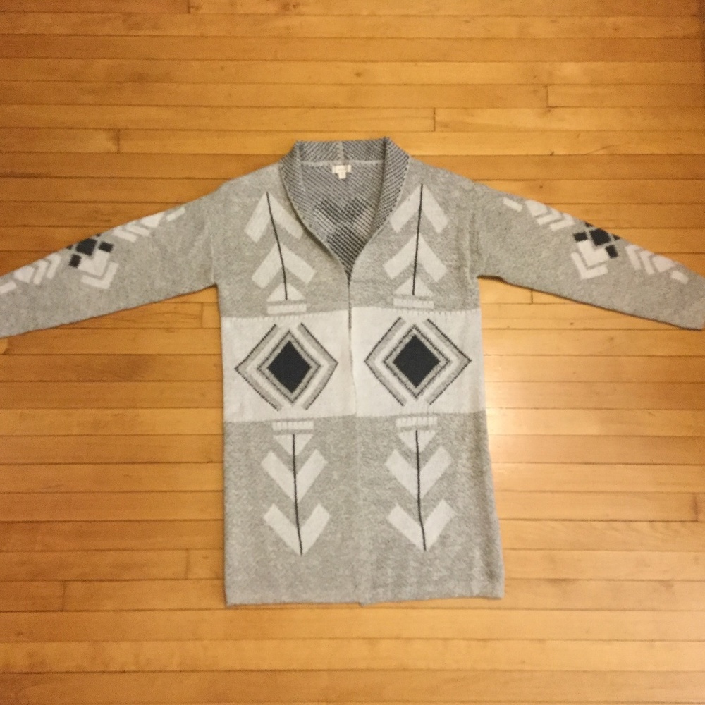 NWOT, Never been worn. Super soft sweater Cardi.